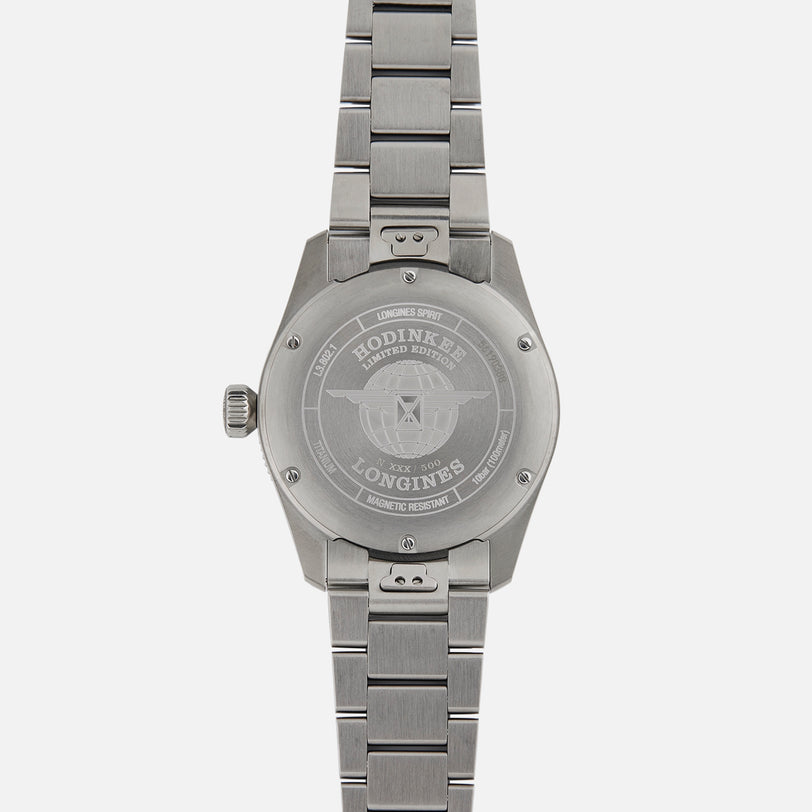 Back view of the Longines Spirit Zulu Time Limited Edition For Hodinkee, showcasing engraved text and details on its Grade 5 Titanium case back.