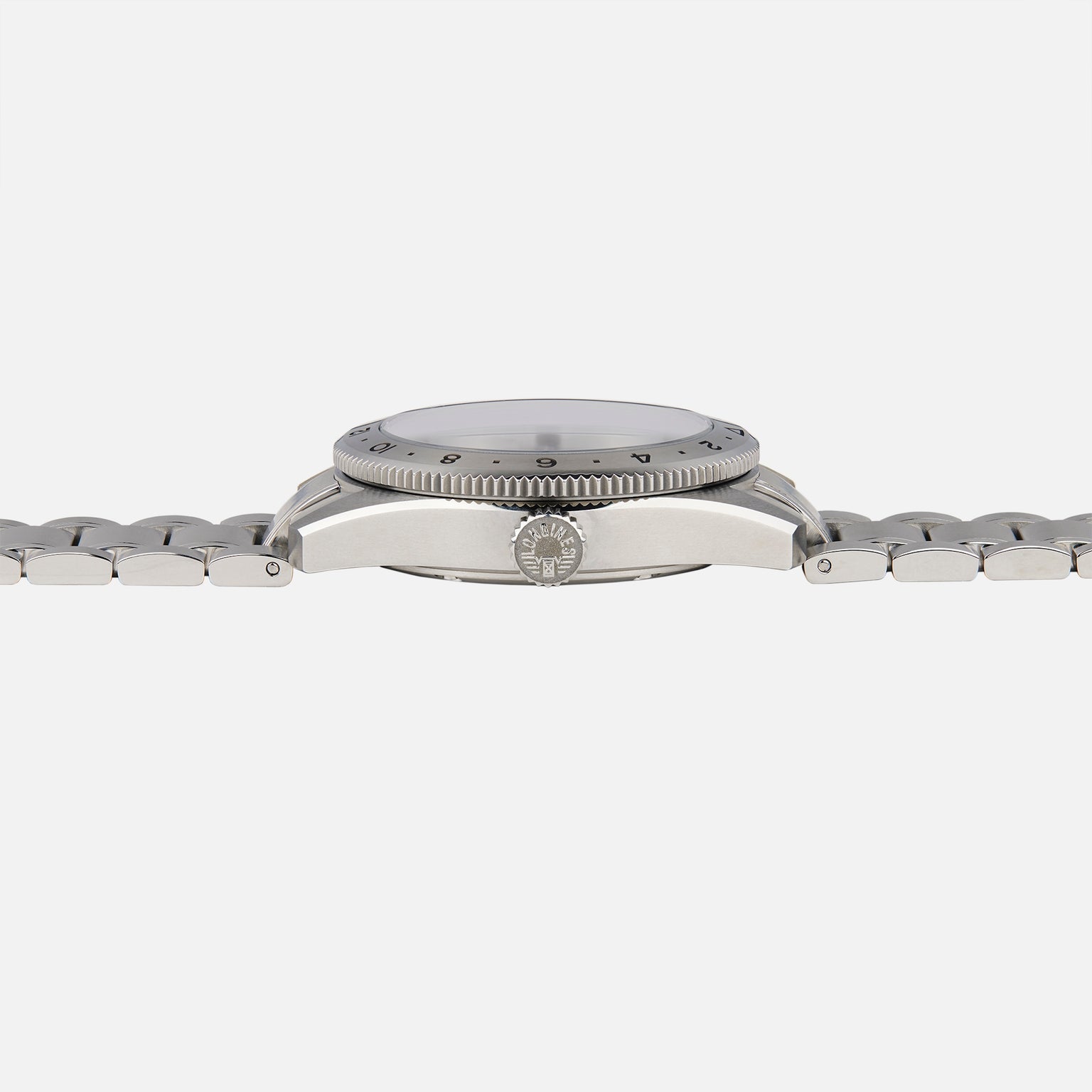 Side view of the Longines Spirit Zulu Time Limited Edition For Hodinkee by Longines, featuring a metal band and highlighting the crown and case details against a plain white background.