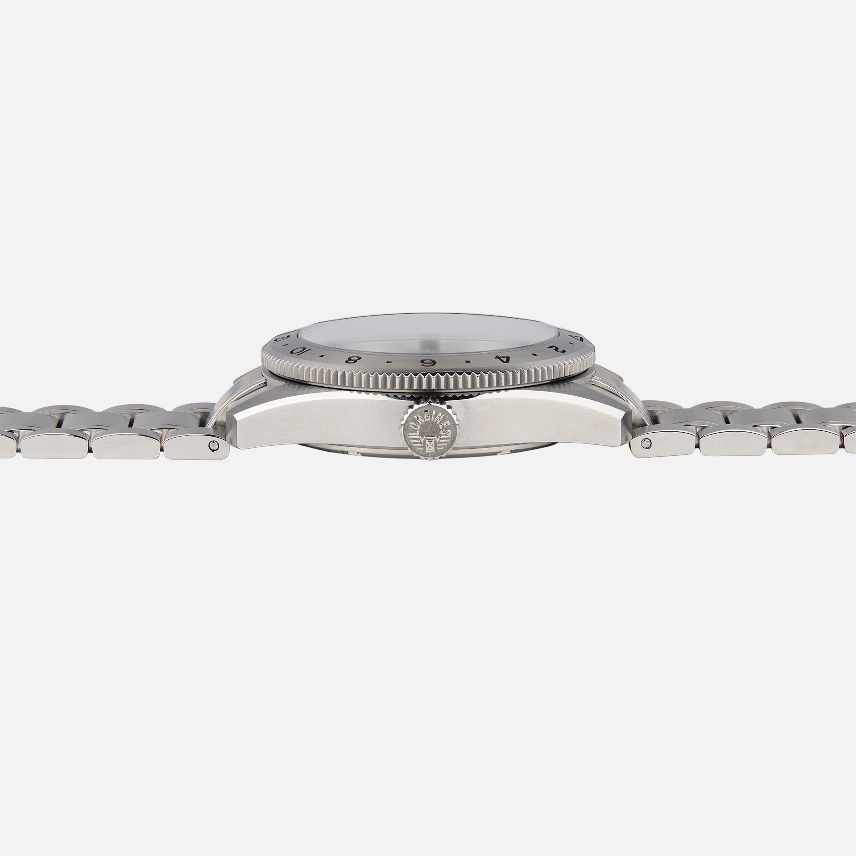 Side view of the Longines Spirit Zulu Time Limited Edition For Hodinkee by Longines, featuring a metal band and highlighting the crown and case details against a plain white background.
