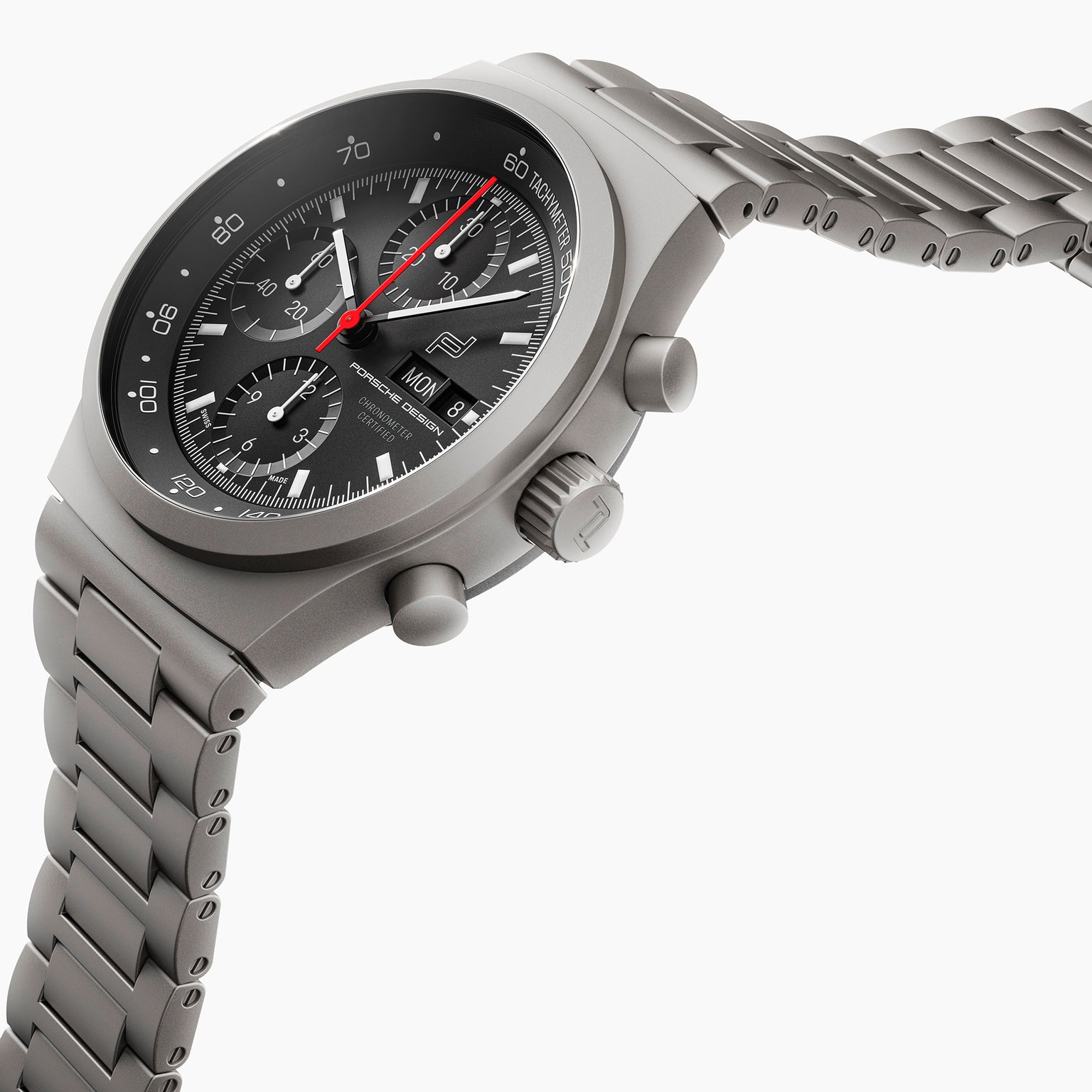 Silver watch with a detailed face on a white background