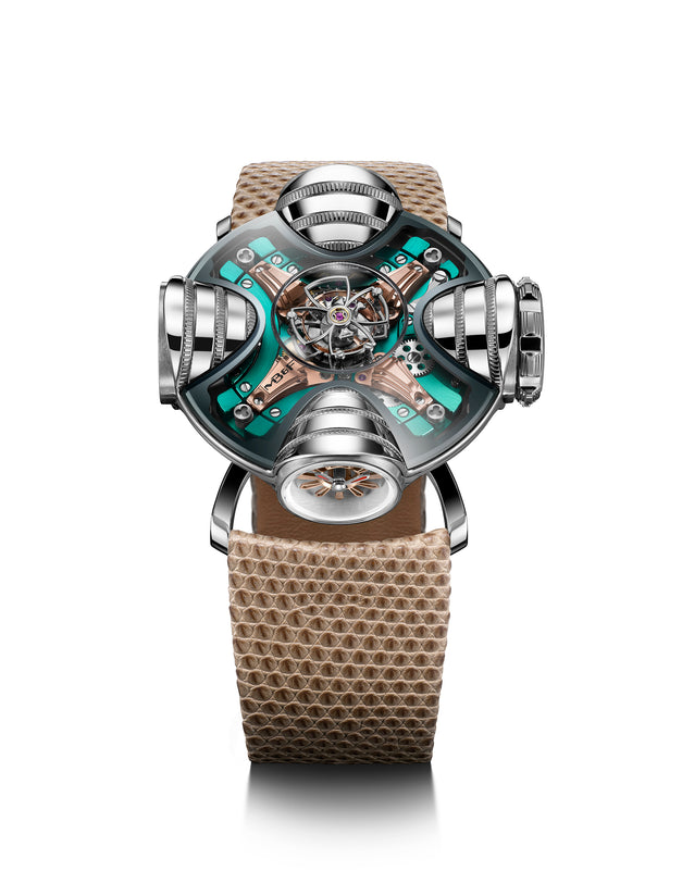 The MB&F HM11 Art Deco is a futuristic wristwatch with a complex mechanical design, tan textured strap, and green metallic face. Its skeletonised dial exposes intricate parts, while cylindrical displays protrude from the Art Deco-inspired case.