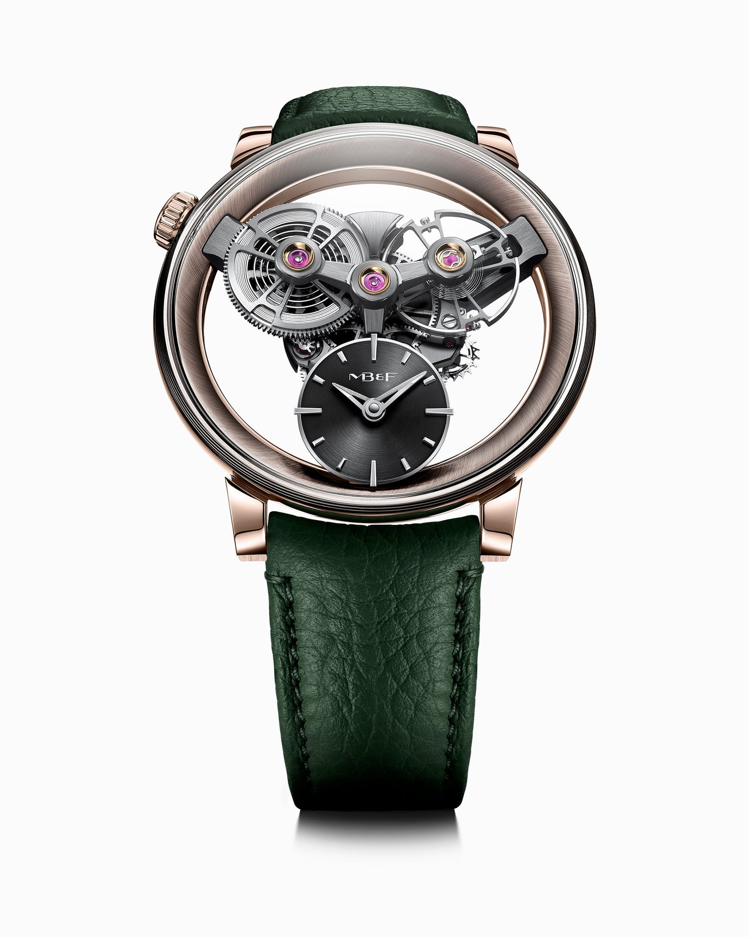 The MB&F SP One Rose Gold is a luxury watch featuring exposed gears, a black dial, and a green leather strap, showcased on a white background.