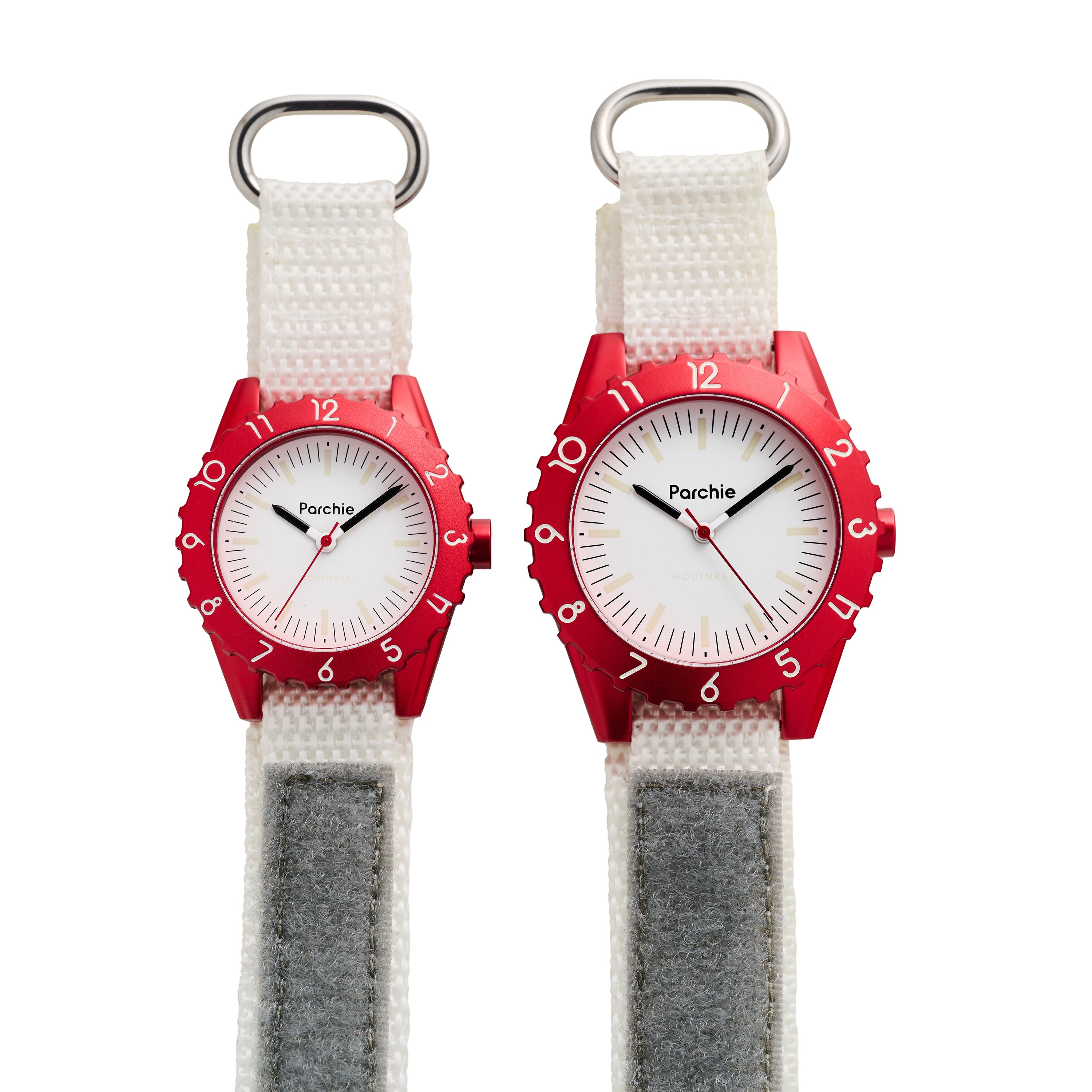 Size comparison of the 32mm Parchie Lunar Time Hodinkee Limited Edition on the left with the 36mm version on the right. 