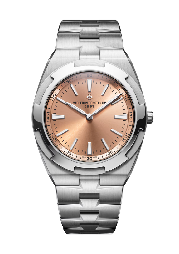 Stainless steel watch with salmon dial, silver hour markers, and matching metal bracelet.
