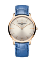 Vacheron Constantin Patrimony watch with rose gold case, silver dial, and blue leather strap.