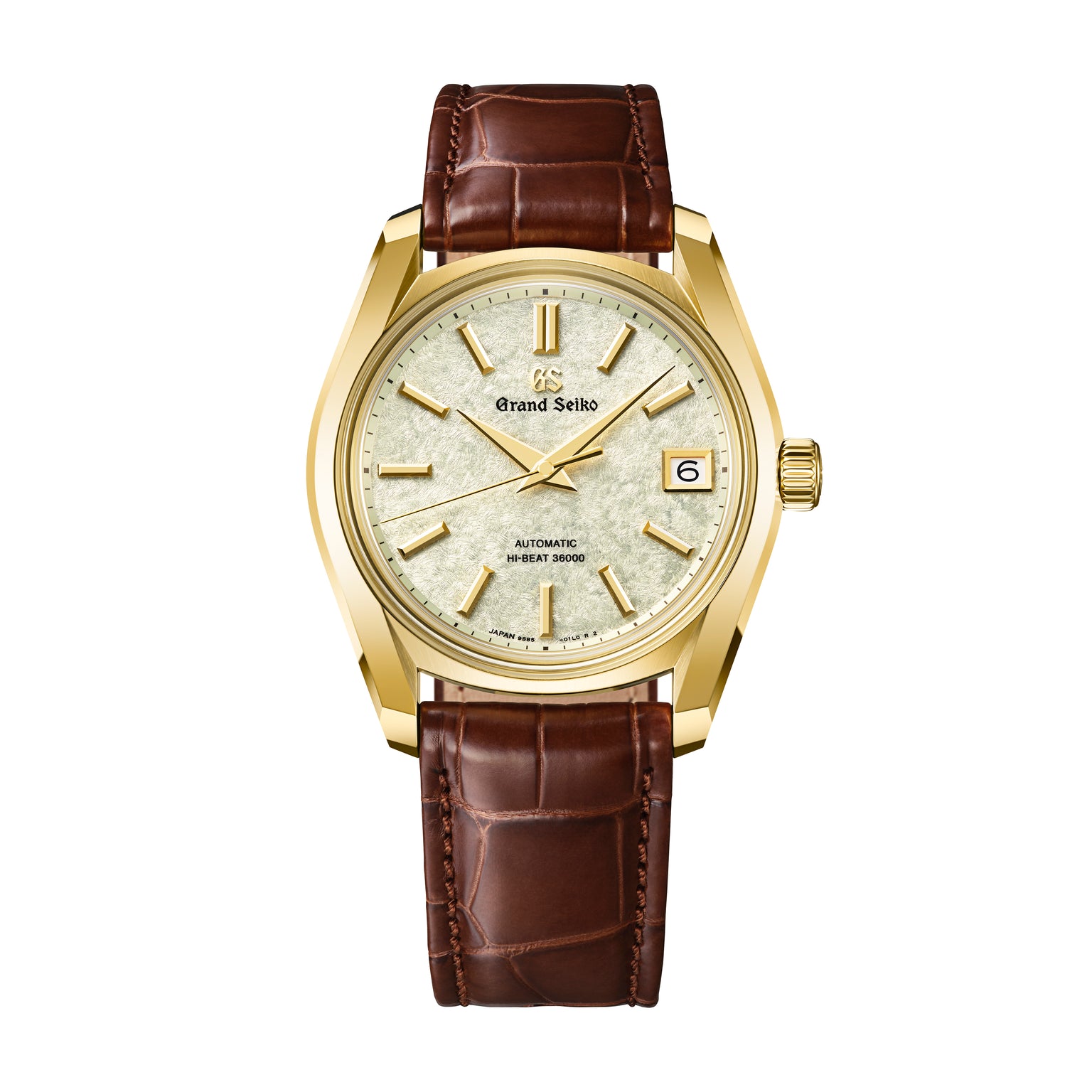 Grand Seiko automatic watch with gold-tone case, silver dial, gold hour markers, and brown leather strap with date window.
