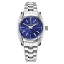 Silver stainless steel watch with blue dial, gold hour markers, and three-link metal bracelet.