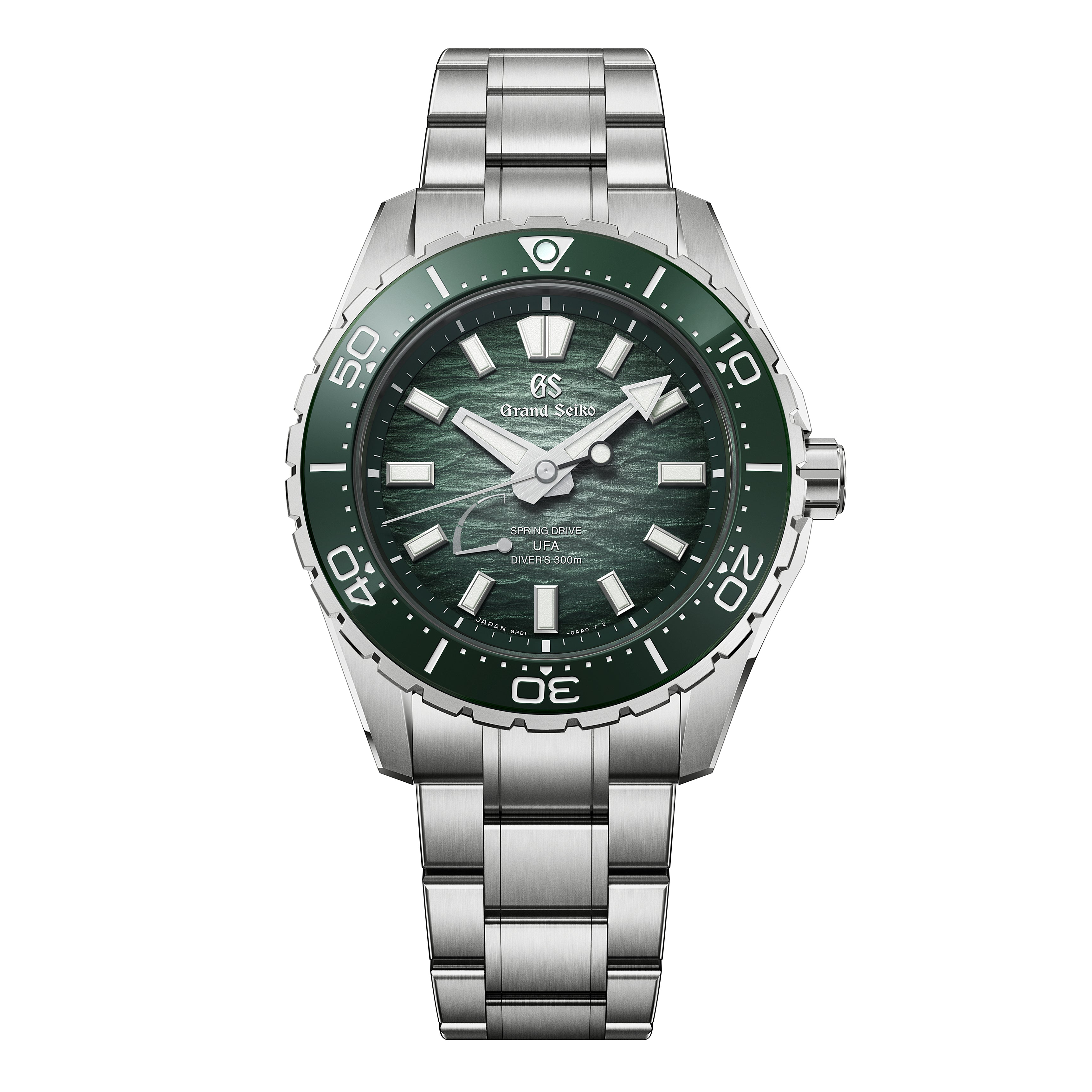 Grand Seiko diver watch with green dial, green bezel, and stainless steel bracelet.