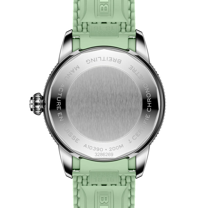 Back of a Breitling Superocean Heritage Automatic 36, featuring a mint green rubber strap and engraved stainless steel case back.