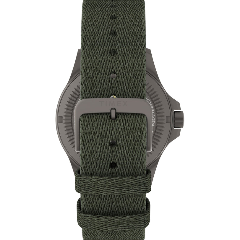 Close-up of the Expedition Titanium Automatic by Timex, featuring a titanium case and a green textured fabric strap with a metal buckle engraved with TIMEX, highlighting the precision craftsmanship of this collection.