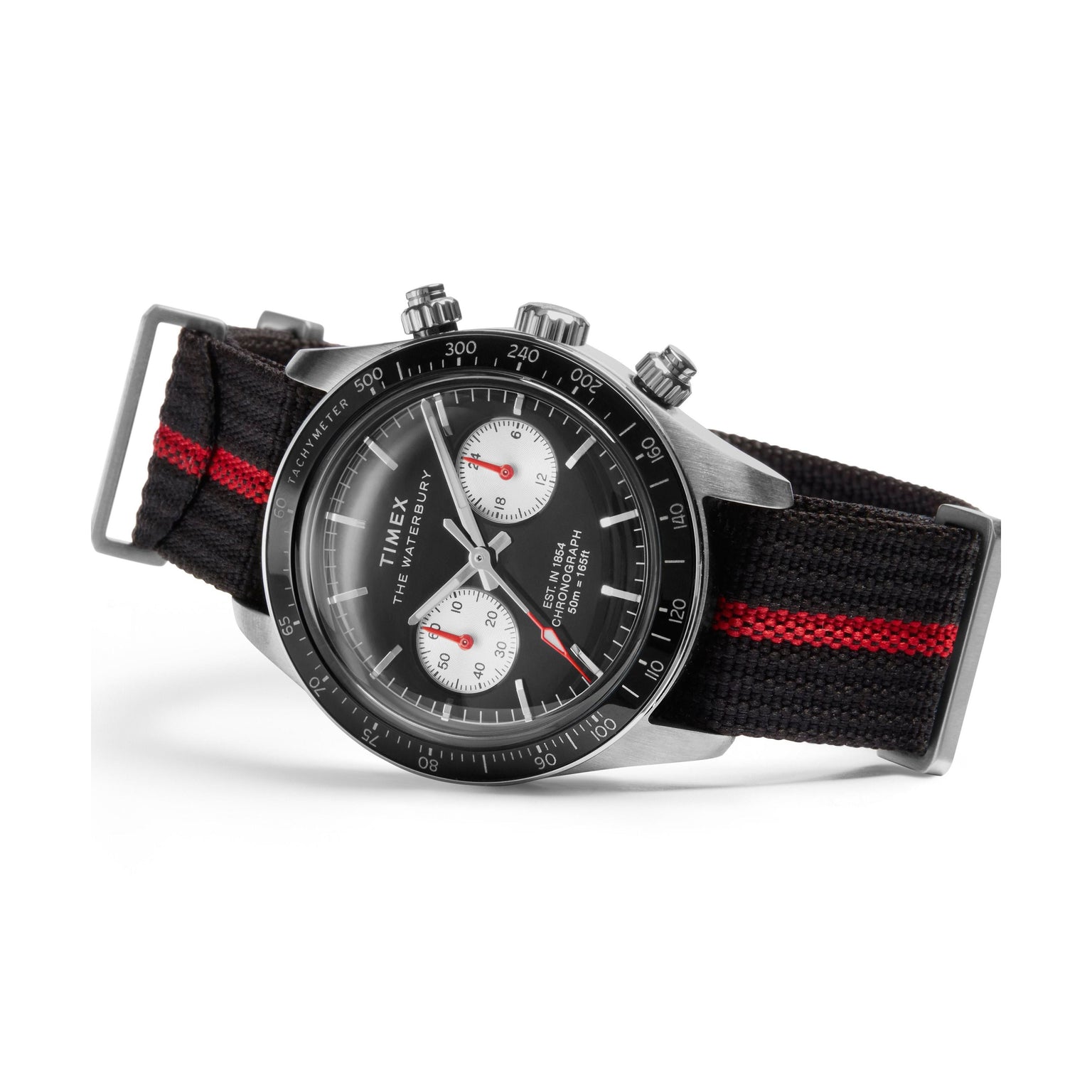 The Timex G SS QZ WTRBY HERT 39 BLK DL FABR STP 25 features a black face with two white subdials and a recycled fabric strap with a bold red stripe, shown angled to highlight side buttons and a metal buckle.