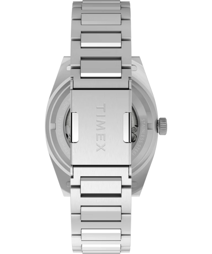 A close-up of the back of a stainless-steel Timex Expedition® Capstone Automatic watch shows the engraved Timex clasp and its Japanese automatic movement.