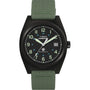 The Timex Expedition® Capstone Automatic watch has a 39mm stainless steel case, green fabric strap, black dial with luminous hands and numerals, date at 3 o’clock, and “AUTOMATIC” above 6 o’clock.