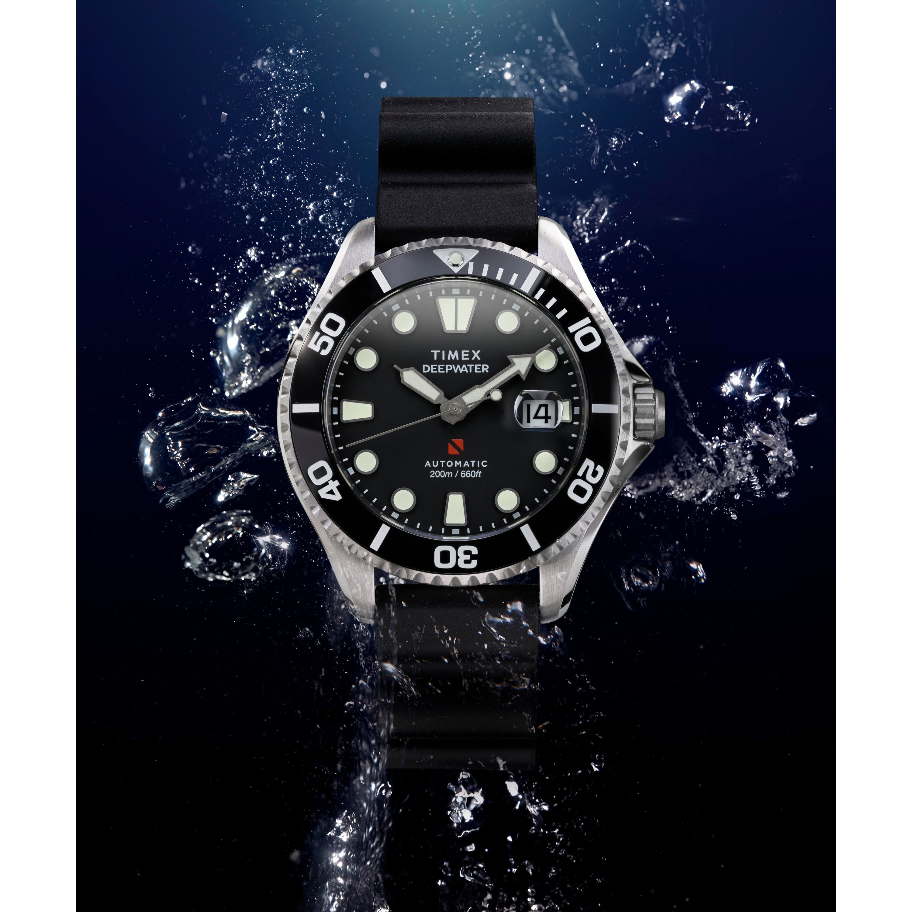 The Timex Deepwater Meridian 200 Automatic dive watch with a black strap and bezel is displayed on a dark blue background with splashing water, showcasing its 200m water resistance and robust durability.