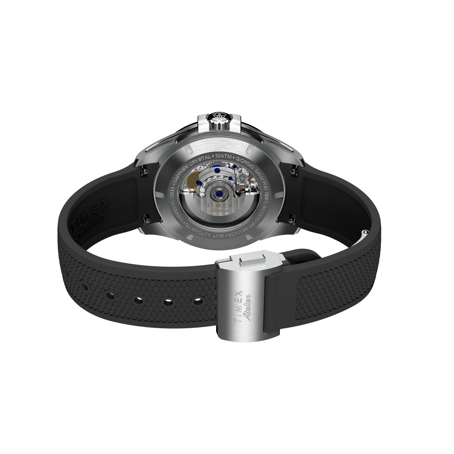 Close-up of the Timex Atelier GMT24 M1a Swiss Made Automatic, featuring a black textured strap and a transparent case back that reveals its mechanical movement and inner components.