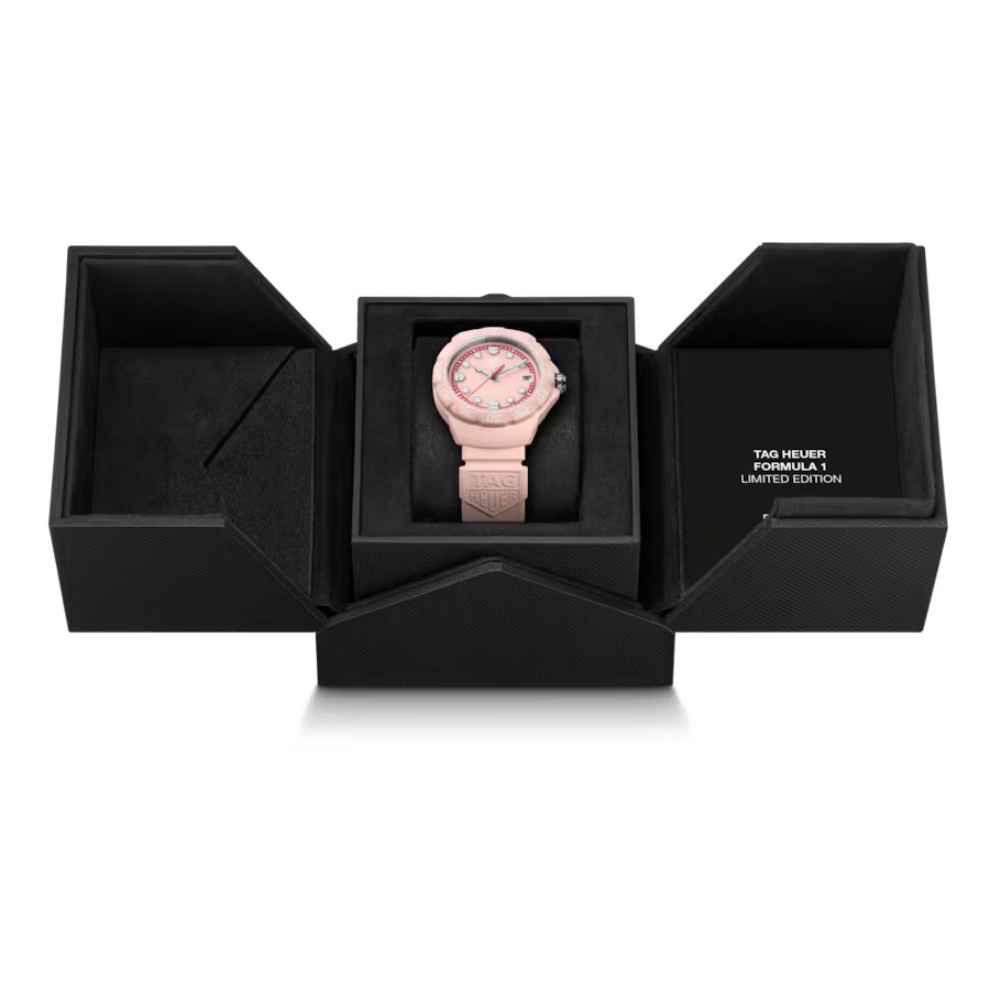 Pink watch in a black box with 'TAG Heuer Formula 1 Limited Edition' text.