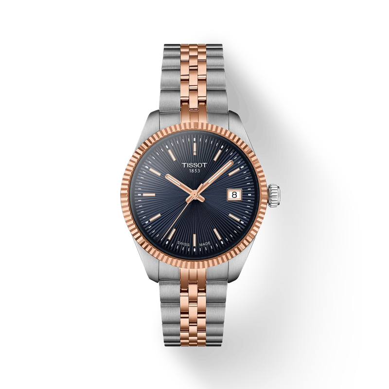 Tissot watch with two-tone rose gold and silver bracelet on a white background