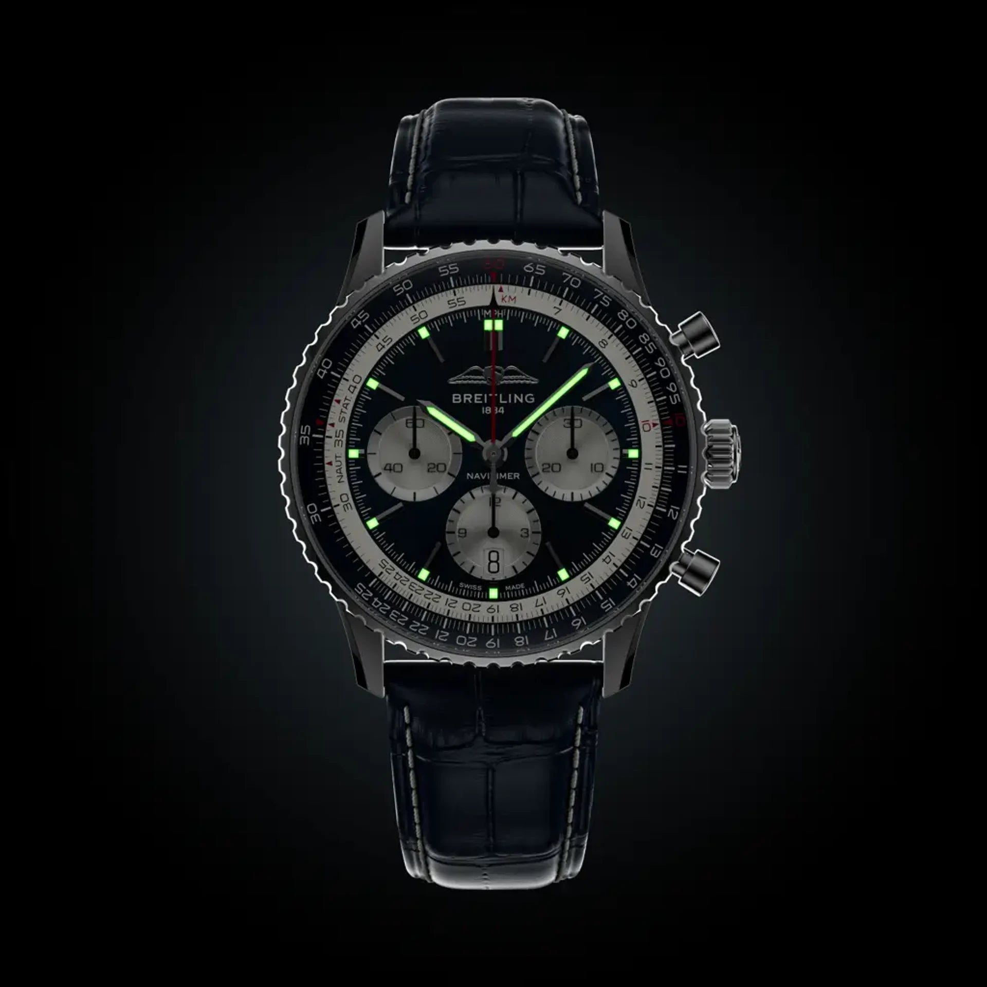 Black Breitling watch with detailed face on a black background