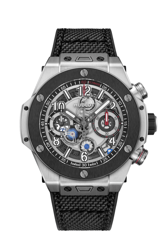 Hublot chronograph watch with titanium case, black ceramic bezel, skeletal dial with Arabic numerals, and black textile strap
