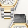 Two-tone gold and silver watches with matching bracelets and black leather straps, displayed from above.