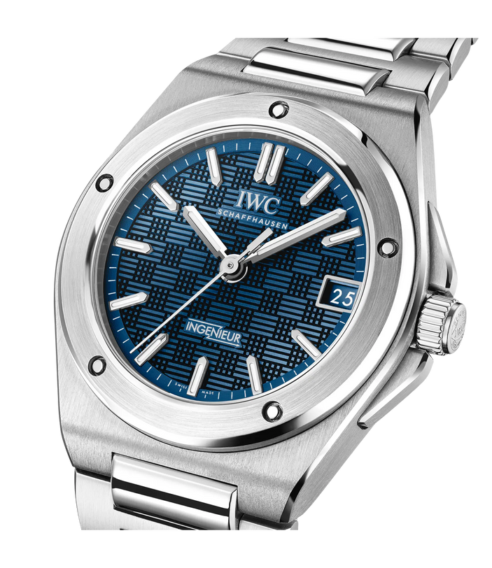 IWC Ingenieur Automatic 35 stainless steel watch with blue dial, applied indices, and matching steel bracelet.