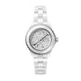 The Chanel J12 Cosmic is a white ceramic watch with a silver bezel and a patterned dial featuring whimsical illustrations, paired with a linked bracelet strap for an elegant look inspired by the classic original.