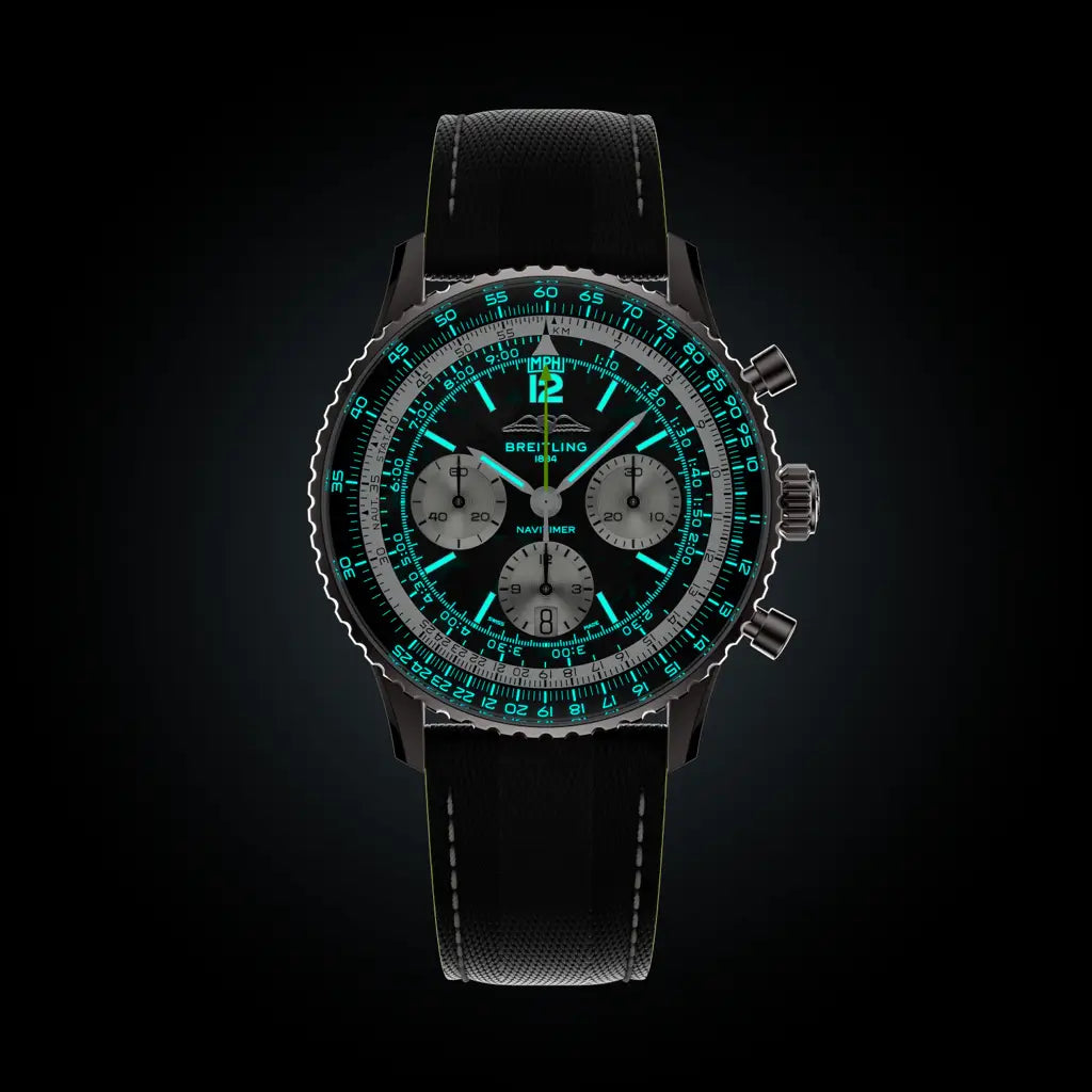 Black watch with green digital display on a black background