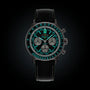 Black watch with green digital display on a black background