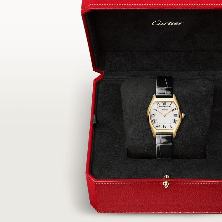 Cartier Tortue small model watch with two-tone case and black leather strap in red presentation box.