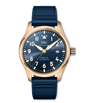 IWC Schaffhausen pilot's watch with rose gold case, blue dial, arabic numerals, and blue rubber strap.