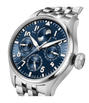 Stainless steel pilot watch with blue dial, perpetual calendar complications, moon phase, and metal bracelet.