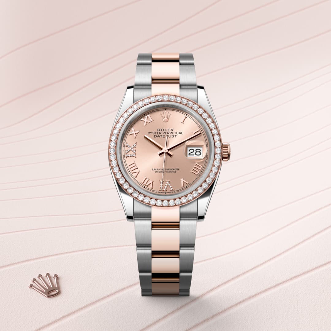 A two-tone Rolex watch with a rose gold bezel and Roman numerals, displayed on a light patterned background.