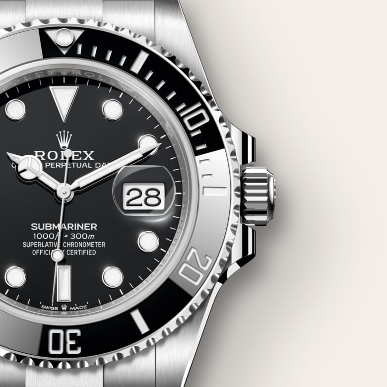 Close-up of a Rolex Submariner watch showing the black dial, date window, and silver bezel.