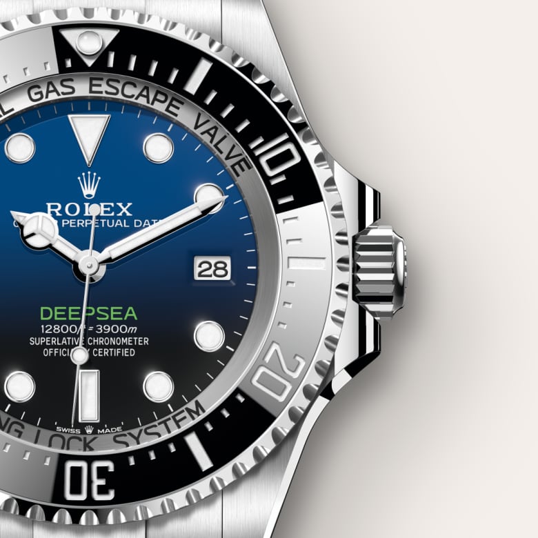 Close-up of a Rolex Deepsea watch face showing the time 10:10 and the date as the 28th.