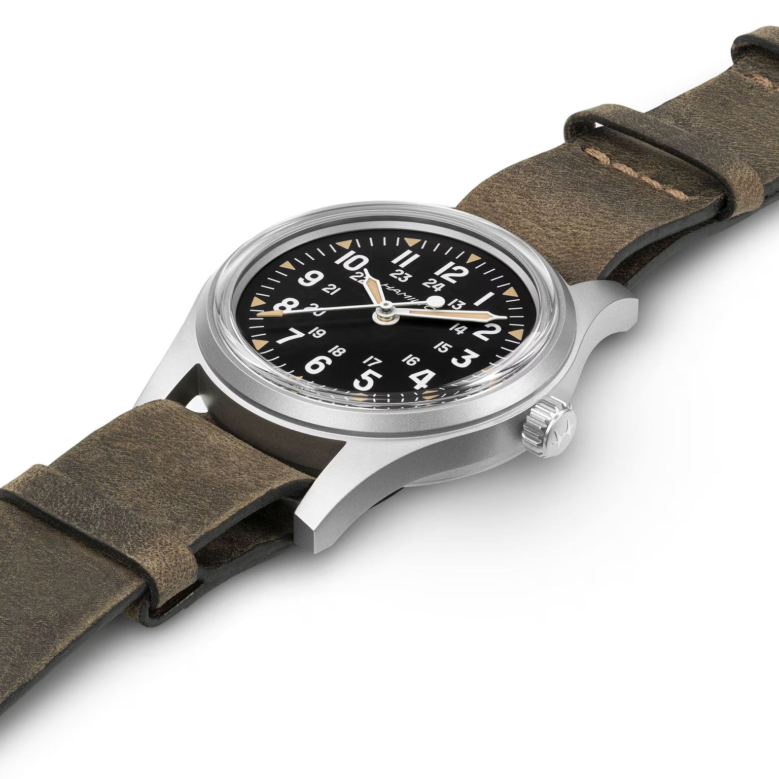 Watch with brown strap and black dial on a white background
