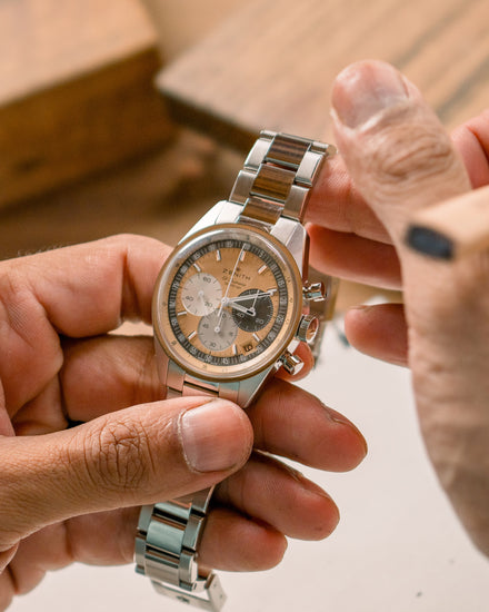 Hands holding the ZENITH Chronomaster Original Limited Edition for HODINKEE