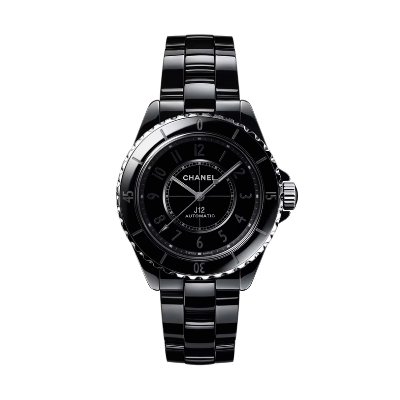 The Chanel J12 Phantom is a black ceramic and steel automatic wristwatch with a round face, silver accents, and a glossy black ceramic bracelet, shown against a white background.