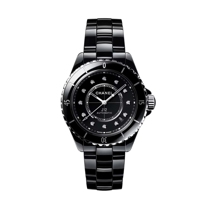 The Chanel J12 is a black ceramic and steel automatic watch with a glossy finish, silver bezel, diamond indicators on its black dial, shown against a white background.