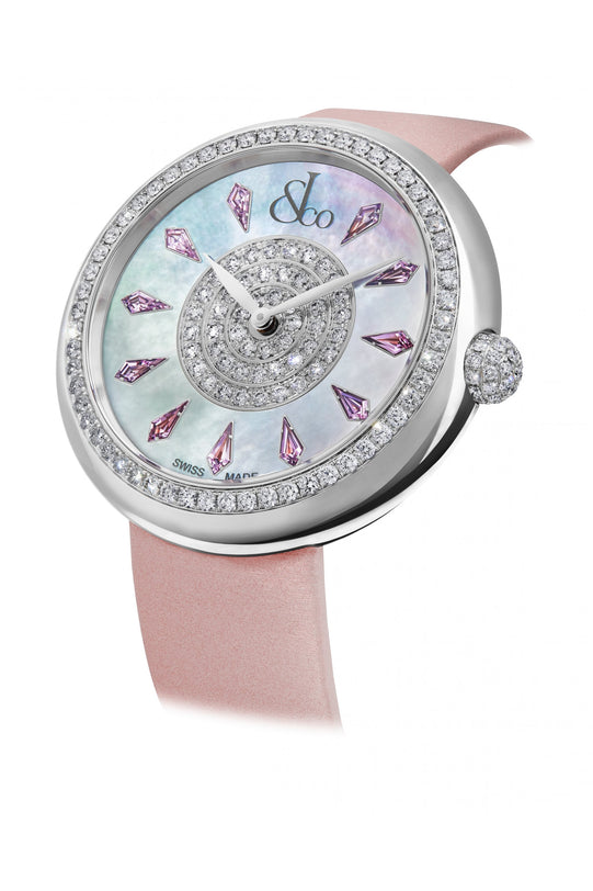Silver watch with mother-of-pearl dial, purple gemstone hour markers, crystal-set bezel, and pink leather strap.