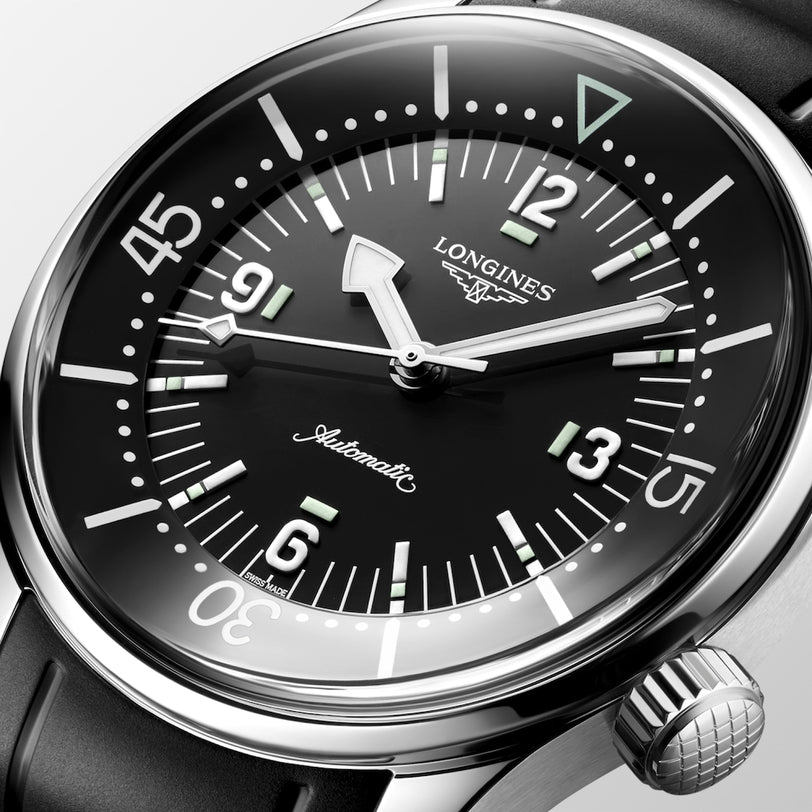 Close-up of the Longines Legend Diver automatic wristwatch featuring a black dial and luminous markers.
