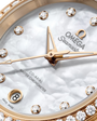 OMEGA Seamaster Aqua Terra 150M 30mm, Moonshine™ gold on Moonshine™ gold Watch, with a Diamond Bezel and Mother-of-Pearl Dial with Diamond Markers on a Moonshine™ gold integrated bracelet.