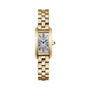 The Cartier Tank Américaine Mini Model features a rectangular 18K yellow gold case, Roman numeral dial, blue hands, linked gold bracelet, and a blue gem on the crown.