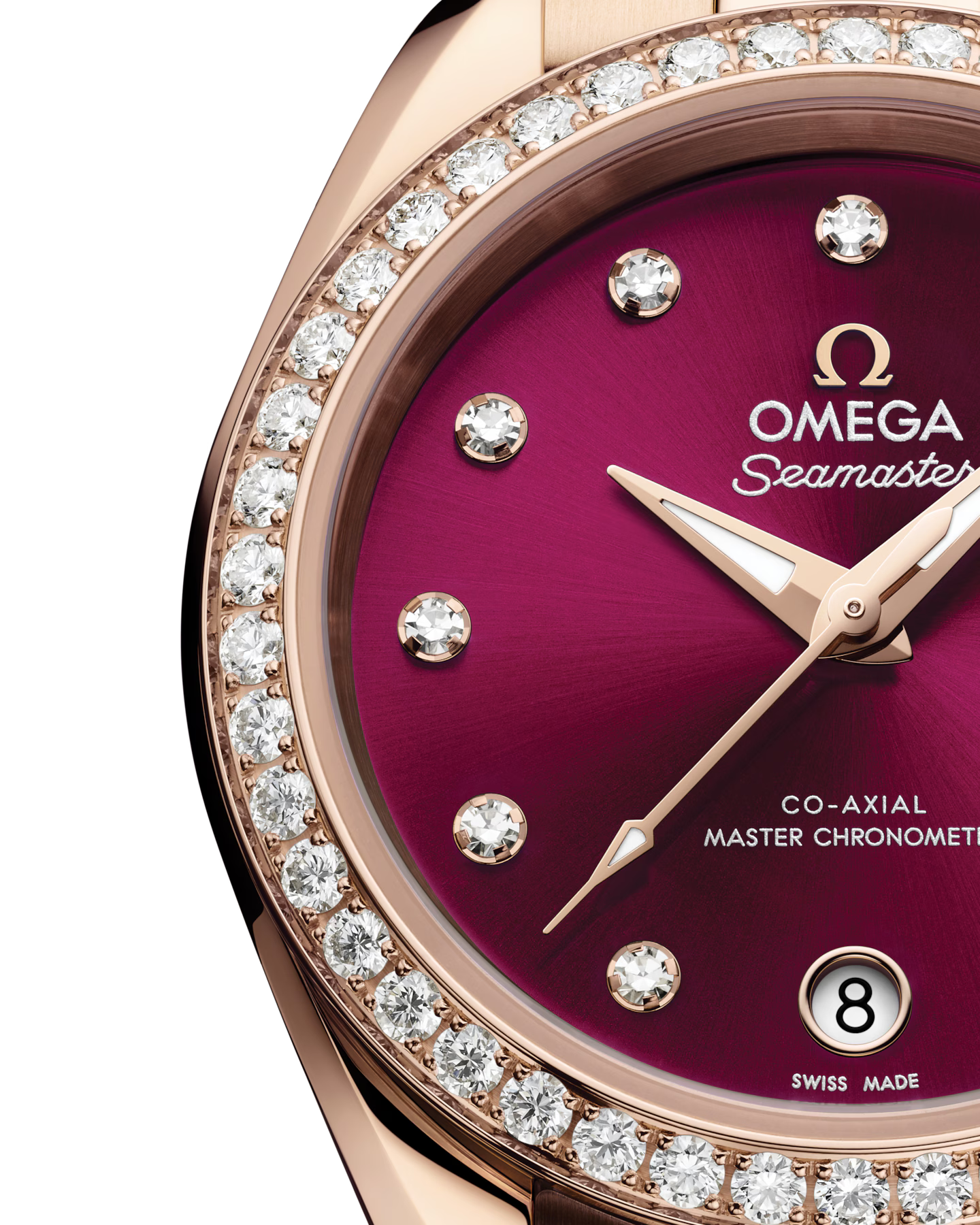 Close up view of the dial of an Omega Seamaster watch with a burgundy dial and diamonds at the hour marks with a rose-gold bracelet