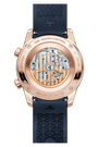 The Jaeger-LeCoultre Polaris Perpetual Calendar features a pink gold case back, visible mechanical movement, engraved branding, and a blue rubber strap with a geometric pattern.
