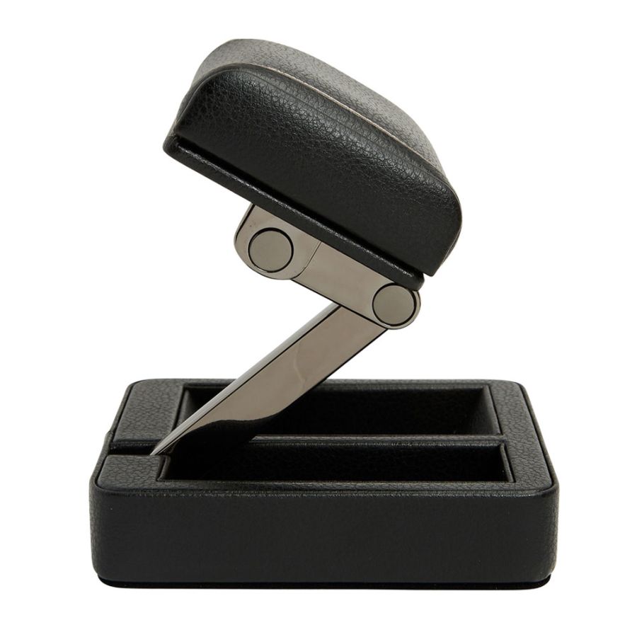 Black desk lamp with adjustable arm on a white background