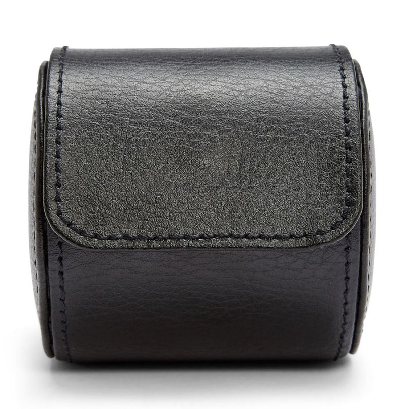 Black leather cylindrical watch roll with flap closure and visible stitching details.