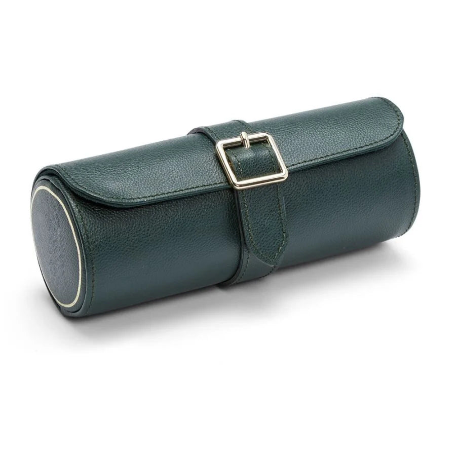 Dark green leather cylindrical watch roll with square buckle closure and interior compartments.