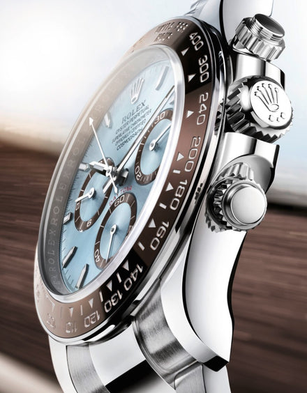 Close-up of a luxury Rolex watch with a blue dial and brown bezel, showing detailed side buttons.