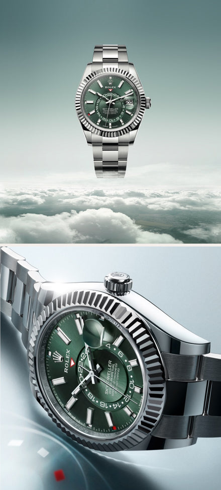 Luxury silver watch with a green face, floating above clouds and shown in close-up detail.