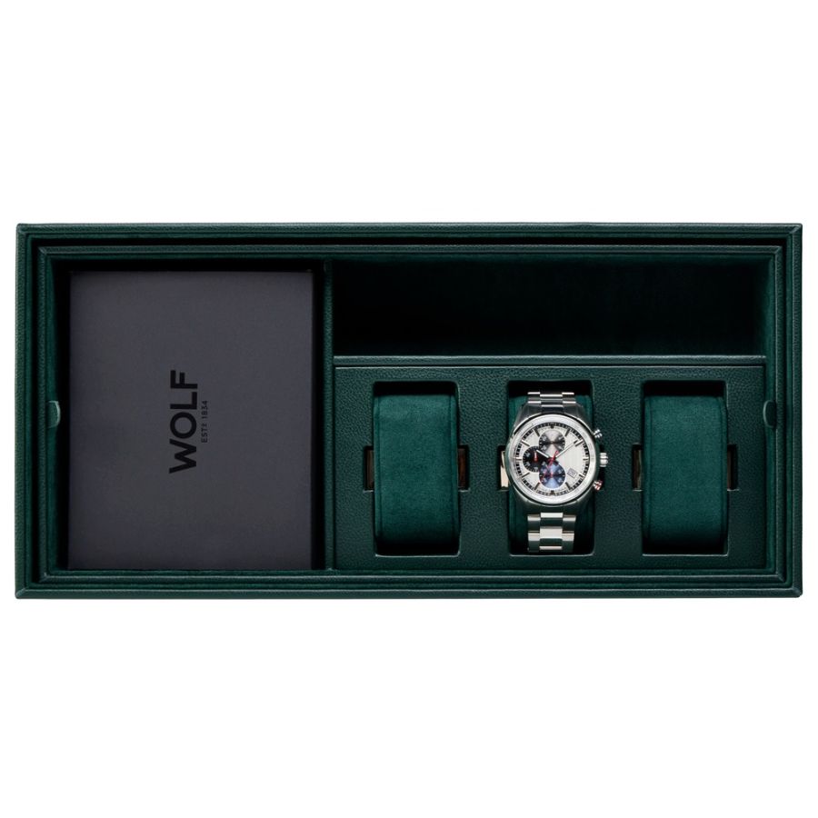 Green leather watch winder safe with four compartments holding a silver chronograph watch and three green cushioned slots.
